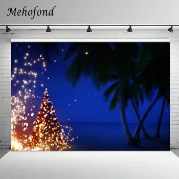 כחול על שפת הים בחוף ערב חג המולד רקע צילום נצנצים אור עץ זיקוקים כפות עץ רקע צילום סטודיו ירי